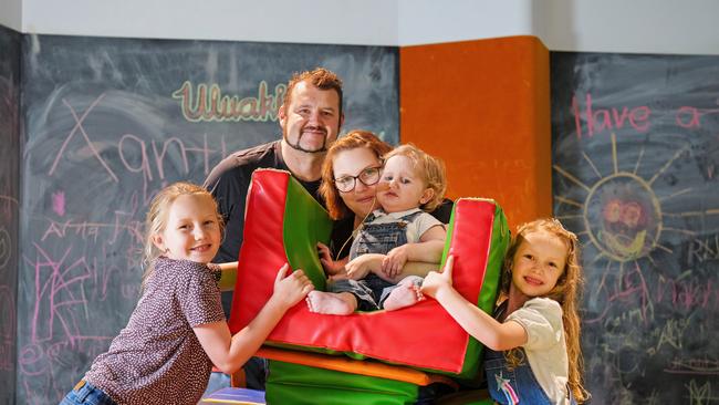 Rebecca and Brett Reed with their children Charlotte, 10, Lachlan, 3, and Olivia, 7. Photo: Flair Media Co.