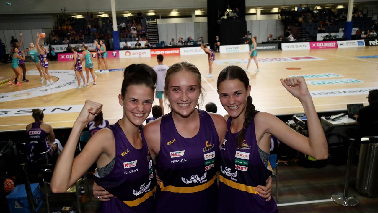 Super Netball game between Firebirds and Vixens at Cairns pop up stadium. Firebirds fans Anessah Oakley from Brinsmead, Charlotte Jonsen from Mooroobool and Samaya Oakley from Brinsmead. PICTURE: STEWART McLEAN