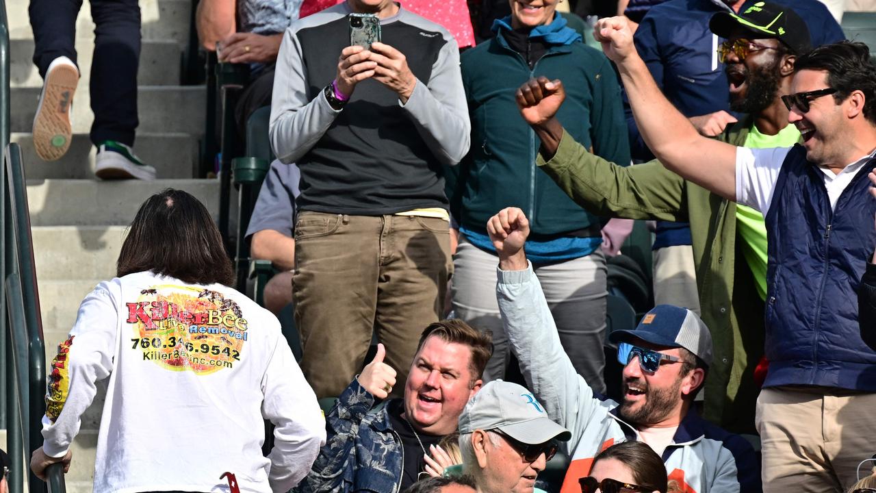 Beekeeper Lance Davis became a fan favourite. Photo by Frederic J. BROWN / AFP