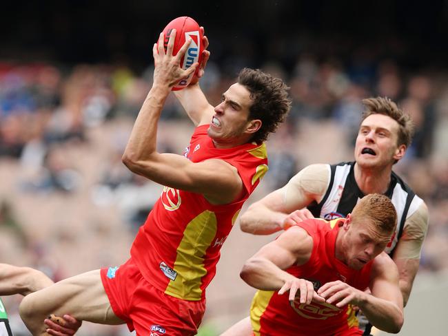 Ben King of the Suns takes a mark during the round 20 AFL match between the Collingwood Magpies and the Gold Coast Suns at Melbourne Cricket Ground on August 04, 2019 in Melbourne, Australia. (Photo by Graham Denholm/AFL Photos via Getty Images)