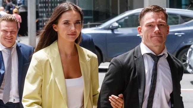 SYDNEY, AUSTRALIA - NewsWire Photos DECEMBER 8, 2022: Tom Starling (right) arrives at Downing centre court this morning with his girlfriend. Picture: NCA NewsWire / David Swift