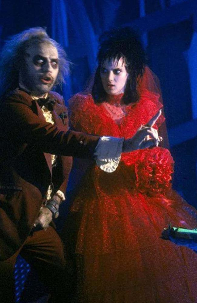 Ryder wore a red wedding dress in the original film when she married Bettlejuice. Picture: Warner Bros.