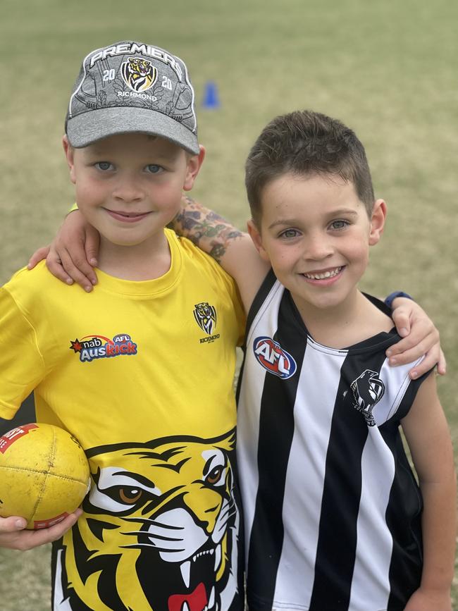 Tom is a Tiger and Hunter supports the Magpies.