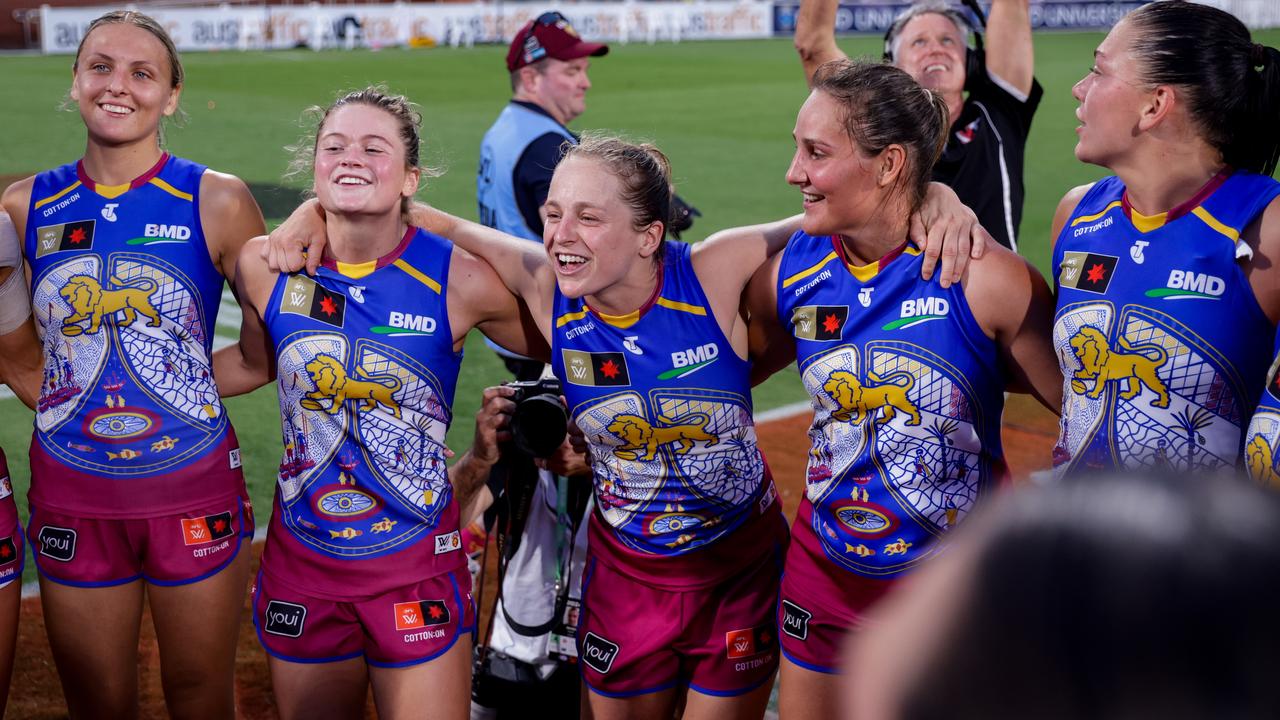 The Brisbane Lions sing the team song. Picture: Russell Freeman/AFL Photos via Getty Images