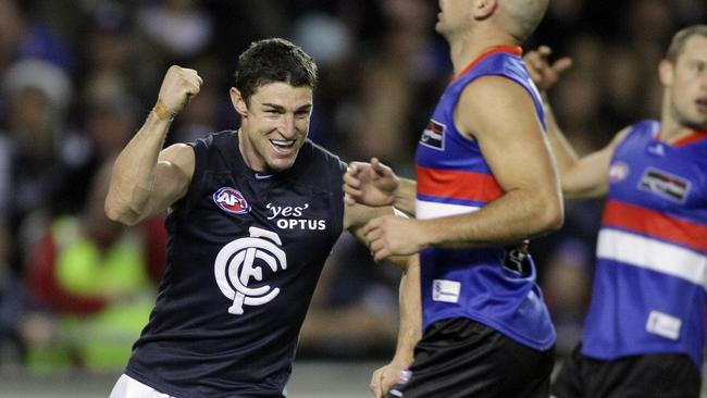 Simon Wiggins celebrates a goal for Carlton against the Western Bulldogs.