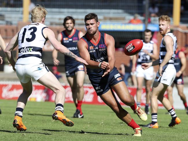 08/04/18 - SANFL - Norwood v South Adelaide at Coopers Stadium. Mitch Grigg gets his handpass away. Picture SARAH REED