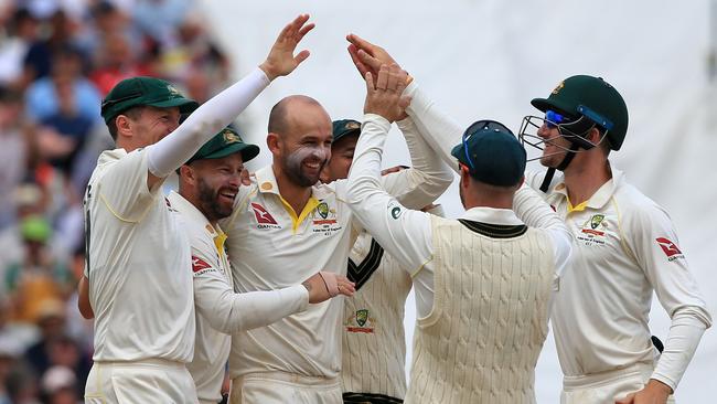 Australia's Nathan Lyon (C) celebrates after taking the wicket of England's Stuart Broad during play on the fifth day of the first Ashes cricket Test match between England and Australia at Edgbaston in Birmingham, central England on August 5, 2019. (Photo by Lindsey Parnaby / AFP) / RESTRICTED TO EDITORIAL USE. NO ASSOCIATION WITH DIRECT COMPETITOR OF SPONSOR, PARTNER, OR SUPPLIER OF THE ECB