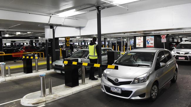 Shoppers exit the Ringwood shopping centre. Picture: Steve Tanner