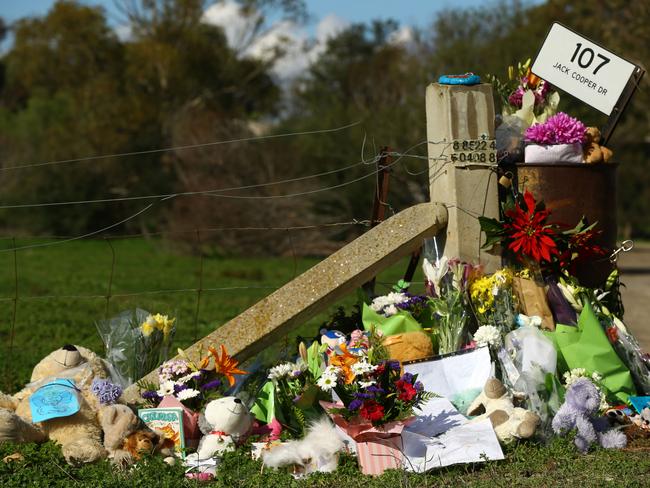 Tributes left at the scene of the Hillier triple tragedy. Picture: Tait Schmaal.