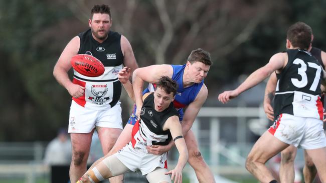 Riley Triffett (New Norfolk) and James McIndoe (Huonville Lions) do battle earlier this year. Picture: Nikki Davis-Jones