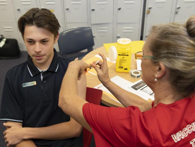 A school student receives the Covid vaccine in Darwin. Picture: Julianne Osborne