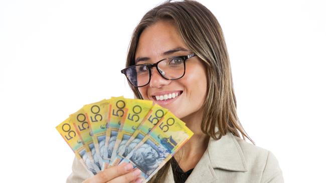 A young businesswoman holding a handful of Australian fifty dollar notes; money wealth generic