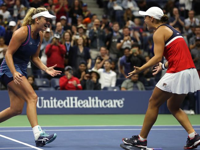 Coco Vandeweghe and Ash Barty (right) celebrate match point after winning the women's doubles final at the 2018 US Open. Picture: Matthew Stockman/Getty