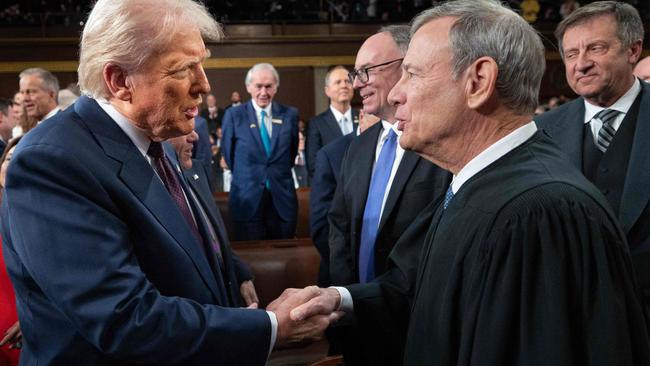 President Donald Trump greets Chief Justice of the United States John G. Roberts, Jr as he arrives to deliver an address to a joint session of Congress at the U.S. Capitol on March 04, 2025 in Washington, DC. (Photo by WIN MCNAMEE / GETTY IMAGES NORTH AMERICA / Getty Images via AFP)