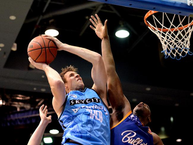 Tom Abercrombie, of the New Zealand Breakers, charges to the basket in a match against the Brisbane Bullets this month. Picture: Bradley Kanaris/Getty