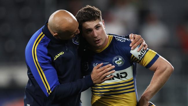 Mitchell Moses is consoled by Blake Ferguson after bowing out of the finals race in 2020. Picture: Brett Costello