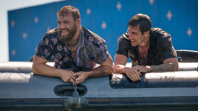 Conor McGregor and Jake Gyllenhaal take a breather between action scenes on Road House.