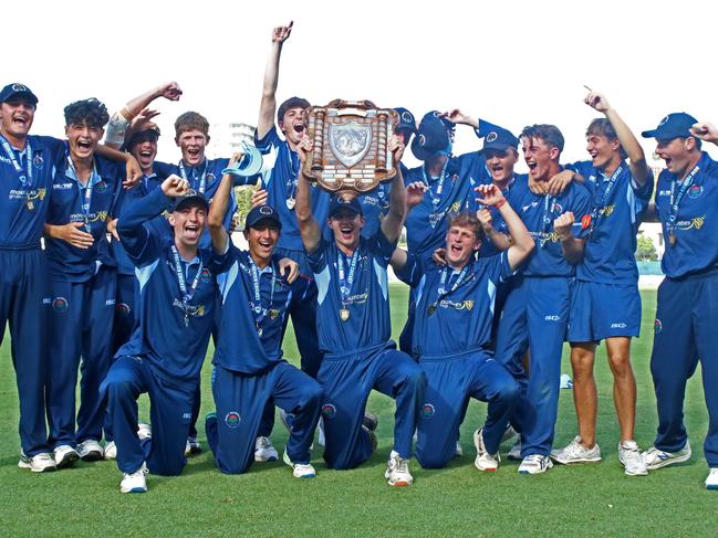 Manly players celebrate with the AW Green Shield. Picture: Warren Gannon Photography