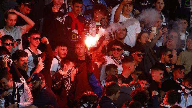 Fans set off flares during the match between Melbourne City and Melbourne Victory. Picture: Getty