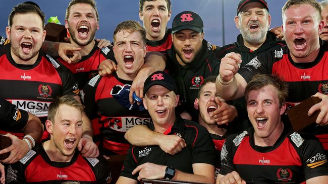 Simon Cron with his premiership winning Norths team.