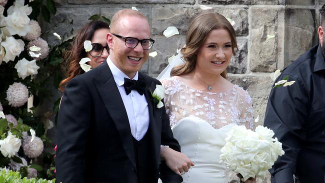 Paula Pratt and Nassib Thoumi walk out of the church after getting married at Our Lady Star of The Sea church in Watsons Bay in February.