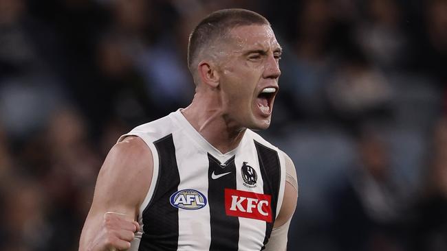 MELBOURNE, AUSTRALIA - AUGUST 23: Darcy Cameron of the Magpies celebrates a goal during the round 24 AFL match between Melbourne Demons and Collingwood Magpies at Melbourne Cricket Ground, on August 23, 2024, in Melbourne, Australia. (Photo by Darrian Traynor/Getty Images)