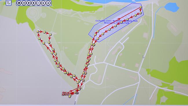 The team tracks the movements of former offenders on screen.