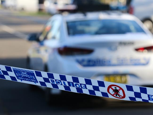 SYDNEY, AUSTRALIA - NEWSWIRE PHOTOS June 14 2022: A general stock image of a Police tape in front of a Police car in Sydney. Picture NCA Newswire/ Gaye Gerard.