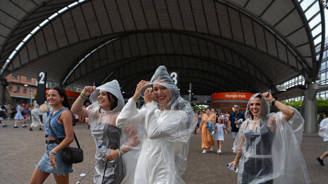 Despite heavy rainfall, Swifties have flocked to Accor Stadium to watch Taylor Swift perform live. Picture: NCA NewsWire / Flavio Brancaleone
