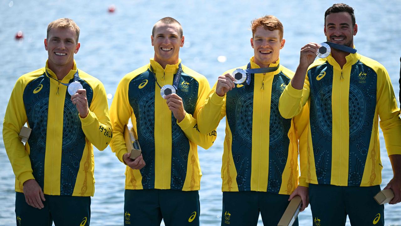 From right, Australia's silver medallists Riley Fitzsimmons, Pierre Van Der Westhuyzen, Jackson Collins and Noah Havard celebrate on the podium during the medal ceremony. Picture: Bertrand Guay/AFP