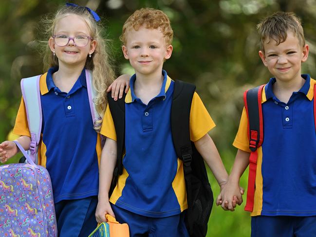 13/01/2023: Triplets Elaina , Aiden and Clay,  Davey 5, mum Lorren Davey,  getting ready for school, and all the costs involved, at a park in Birkdale,  Brisbane. pic Lyndon Mechielsen
