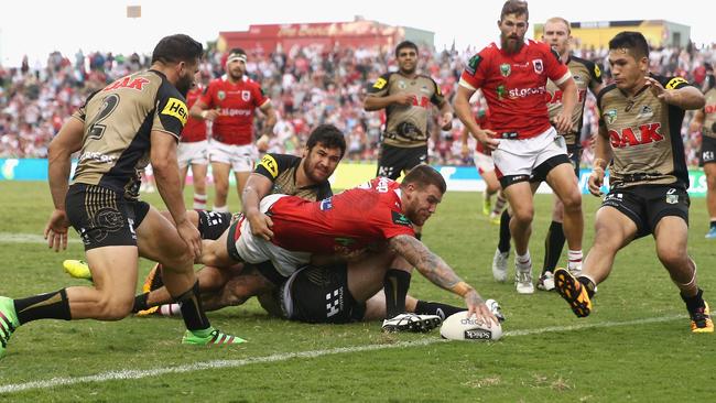 Josh Dugan scores the match-winning try.