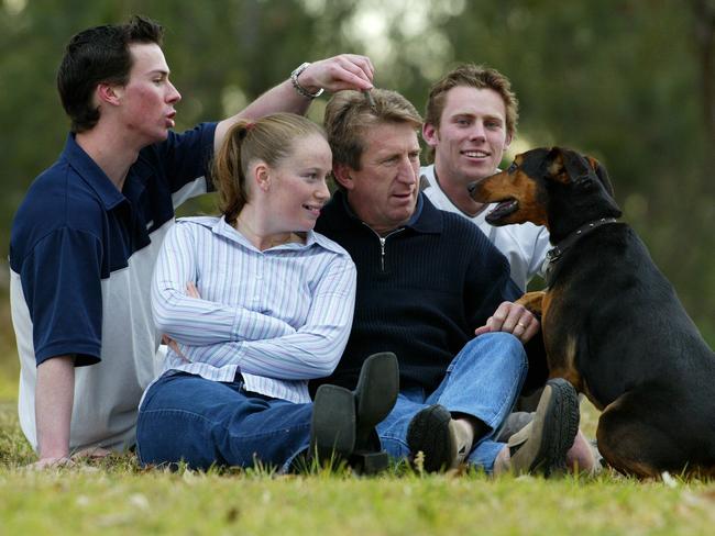 Mortimer in 2002 while he was Bulldogs chief executive with his children Erin (15), Matthew (19, left) and Andrew (20). Picture: Gregg Porteous.