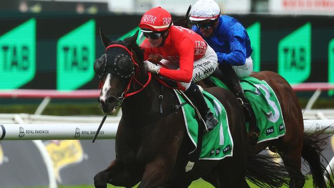 Jamie Kah gets the best out of Mazu in the Group 3 Hall Mark Stakes. Picture: Jeremy Ng/Getty Images