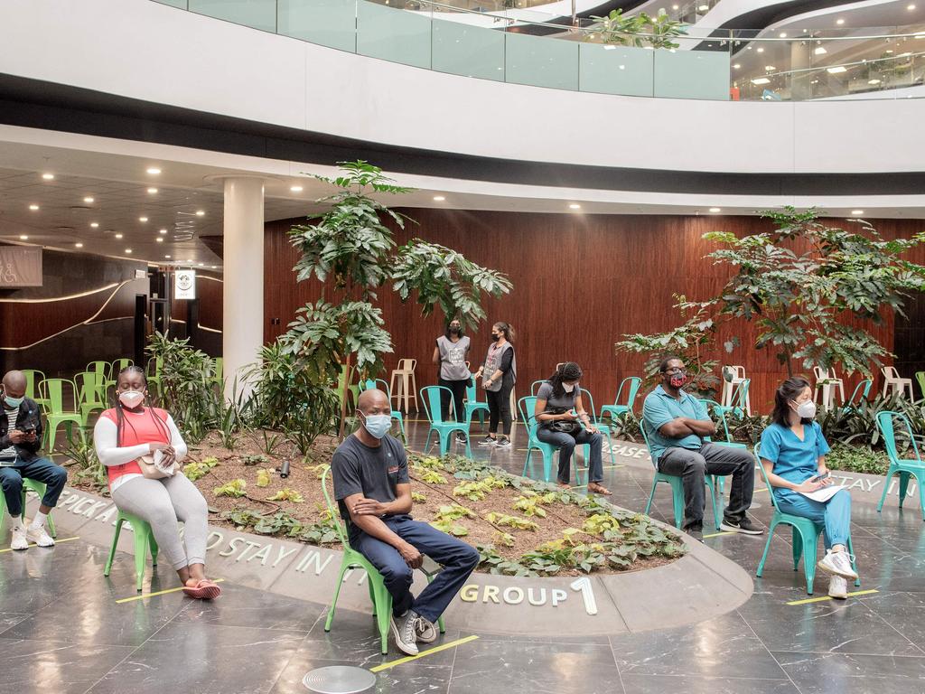 People wait to be vaccinated in Sandton, Johannesburg. Picture: Luca Sola/AFP