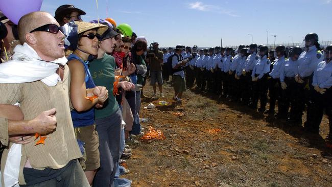 Protesters at Baxter Immigration Detention Centre approach the police line in 2005. Picture: Mark Brake