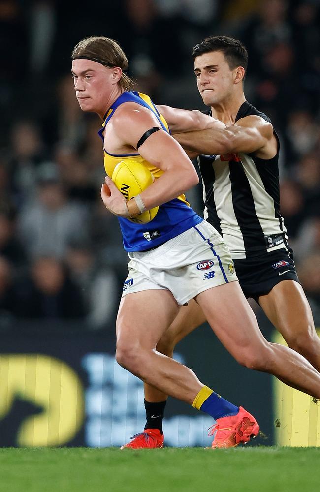 Harley Reid couldn’ rise to the incredibly loft level of Nick Daicos under the roof at Marvel on Sunday. Picture: Michael Willson/AFL Photos via Getty Images.