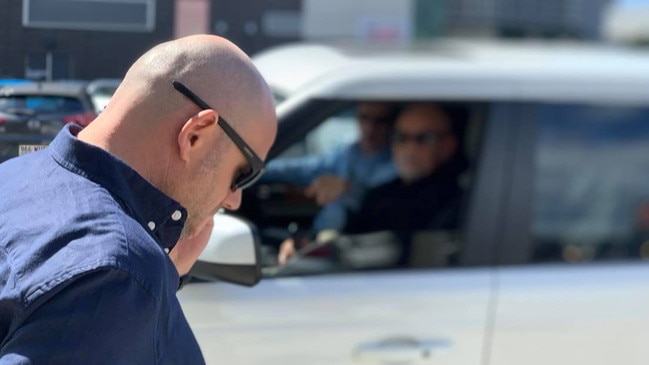 Darren John Ainsworth’s defence team brings a Range Rover around to the front of the courthouse as he makes a swift exit.