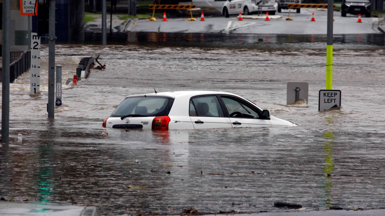 Woman dies in Mount Isa floodwaters as tropical cyclone develops over ...