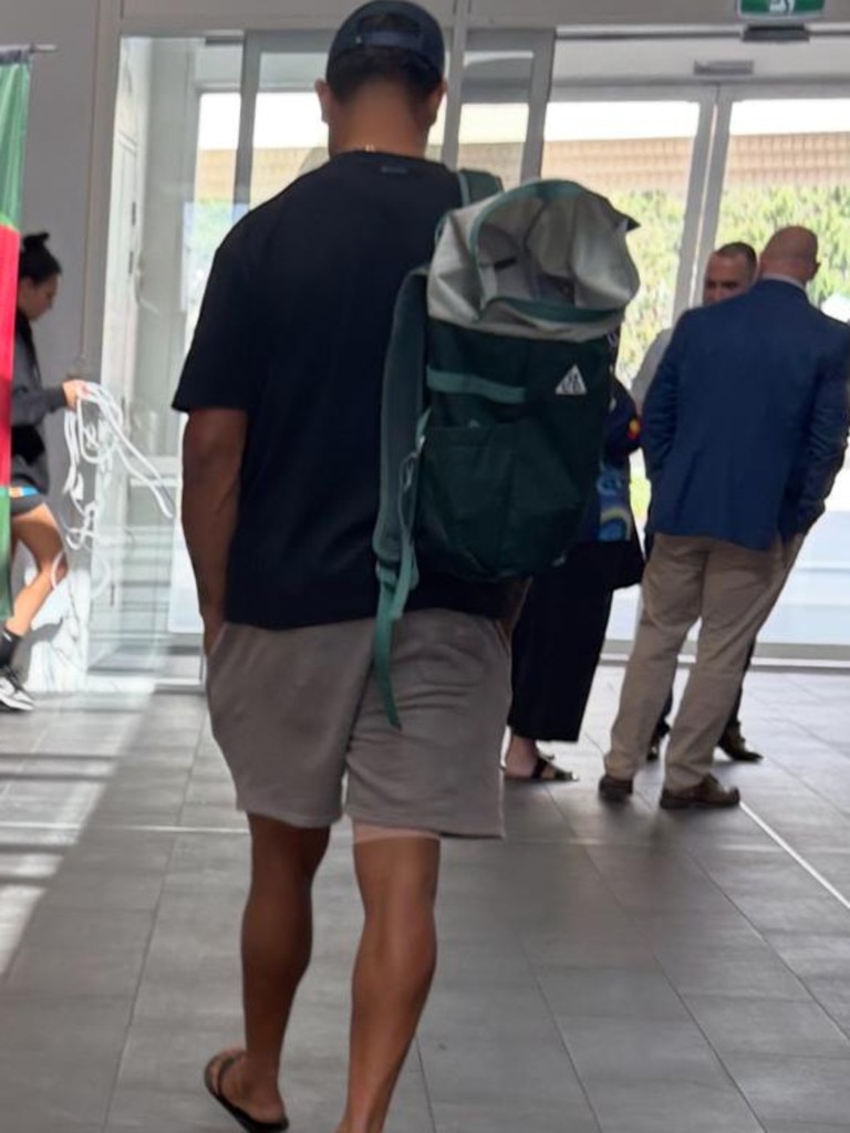 Latrell Mitchell at Souths HQ with strapping on his right hamstring