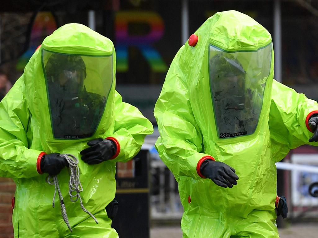 Members of the emergency services clean up after the nerve agent attack on Sergei Skripal and his daughter Yulia. Picture: Ben Stansall / AFP