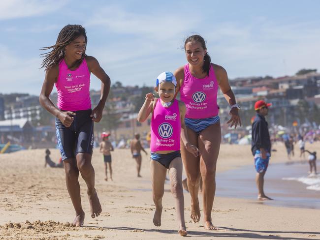 Archer Owens with South Maroubra Nippers who have made him part of the club.  Picture: Matthew Vasilescu