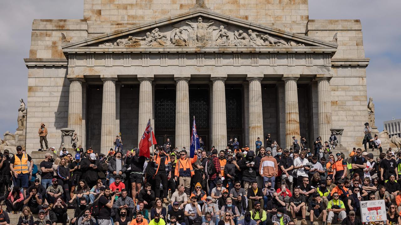 Hundreds of rowdy protesters occupy the Shrine of Remembrance in scenes described as “desecration” by veterans’ groups. Picture: Jason Edwards