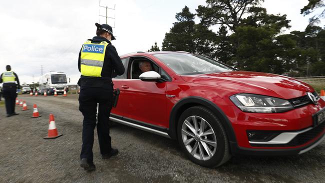 Police carry out checks on the Calder Highway in Victoria. Picture: Getty Images