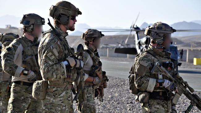 Ben Roberts-Smith with Special Operations Task Group soldiers preparing to deploy in a 2010 offensive. Picture: Department of Defence