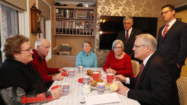 Maybe Four Corners could send the Prime Minister’s department a rundown of its topics for the months ahead and the bureaucrats could see what’s worthy of government action. Pictured: PM Scott Morrison talking to recipients of in-home care. Picture: Kym Smith