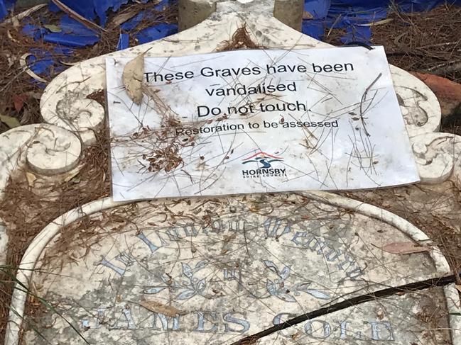 One of the headstones vandalised at Bar Island Cemetery.