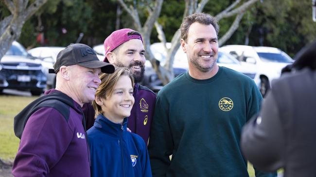 Champion surfer Joel Parkinson with his son Mahli, Allan Langer and Adam Reynolds.