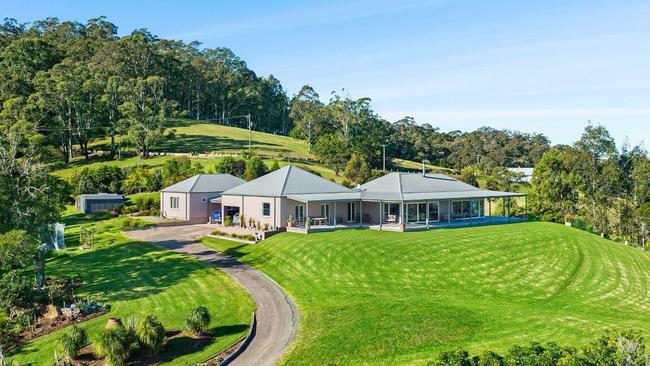 Windmill Cottage, at Narooma, comes with its own boatshed and jetty.