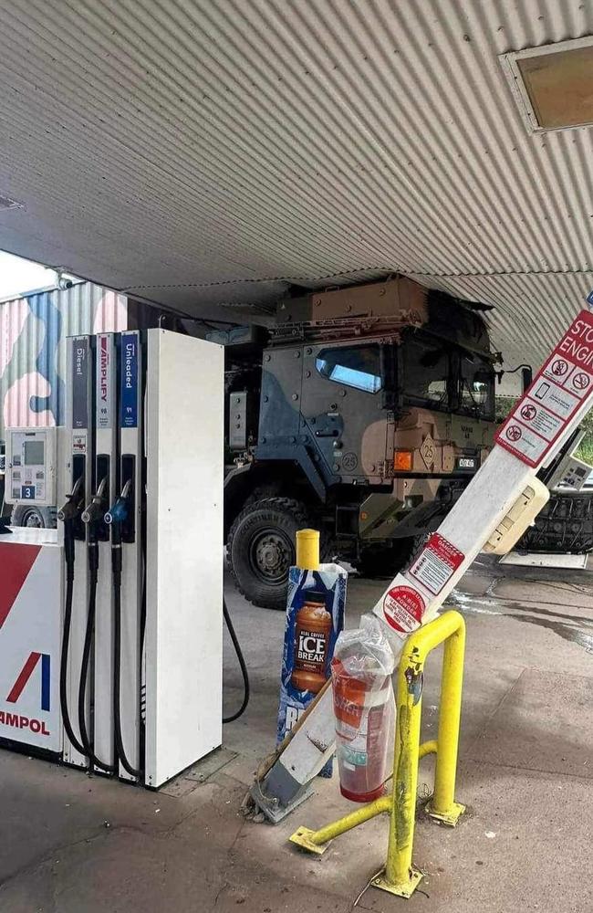 A military vehicle has destroyed an Ampol service station in Sarina, Queensland on May 14, 2024. Picture: Facebook